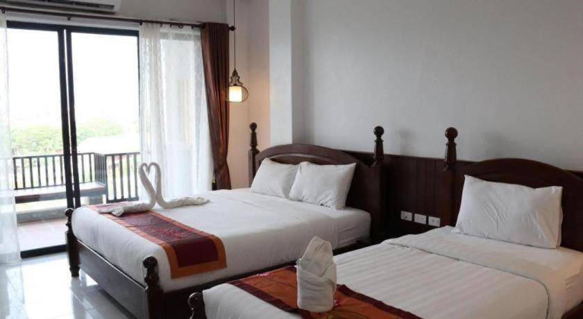 Thavisouk Riverside Hotel Ванг-Виенг Экстерьер фото