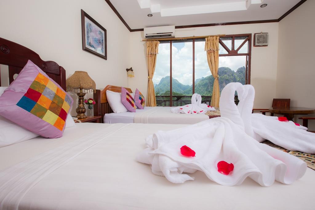Thavisouk Riverside Hotel Ванг-Виенг Экстерьер фото